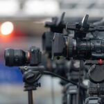 Crypto Cash Shadow Hangs Over Farage Professional video cameras on tripods