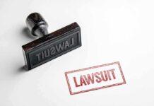 Billions-On-The-Line Lawsuit Targets Tehran Rubber stamp with red lawsuit imprint on white paper