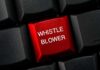 Whistleblower Program Sparks Questions Over Reward Rules Red keyboard key with whistle blower label