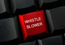 Red keyboard key with whistle blower label