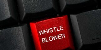 Red keyboard key with whistle blower label