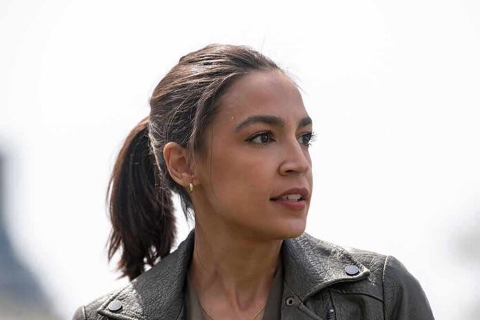 shutterstock_1962025843 woman in a leather jacket looking to the side