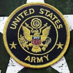 Army Races Toward Robot Launchers United States Army embroidered patch on a green star background