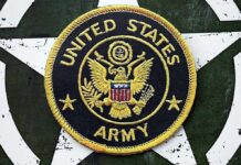 United States Army embroidered patch on a green star background