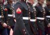 Marines in formal uniforms marching in a parade