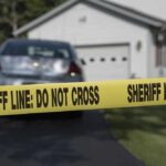 Florida Horror: Twins, Father Found Dead Sheriff line tape blocking a suburban driveway