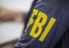 FBI jacket with large yellow letters