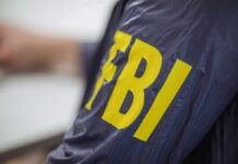 FBI jacket with large yellow letters