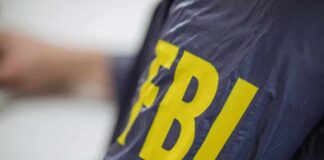 FBI jacket with large yellow letters