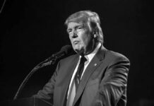 Trump Unleashes Tax-Free Diesel Shock Donald Trump speaking at a microphone in a black-and-white photo