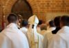 Montana Money Fight Erupts Over Church Grants Bishop in white mitre among clergy during church procession